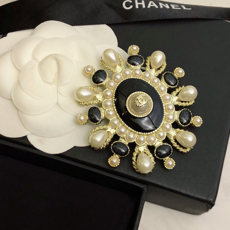 Ch*el brooches
